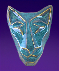 Image of brother cat mask in floating waterfall blue. Portrait facing the viewer.