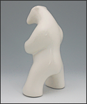 Image of standing polar bear sculpture in carrara white, portrait facing away and slightly to the viewers left.