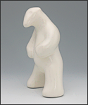 Image of standing polar bear sculpture in carrara white, portrait facing to the viewers left.