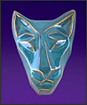 Image of brother cat mask in floating waterfall blue. Portrait facing the viewer.