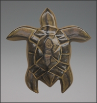 Image of Hanalei Sea Turtle sculpture in black gold glaze, portrait.